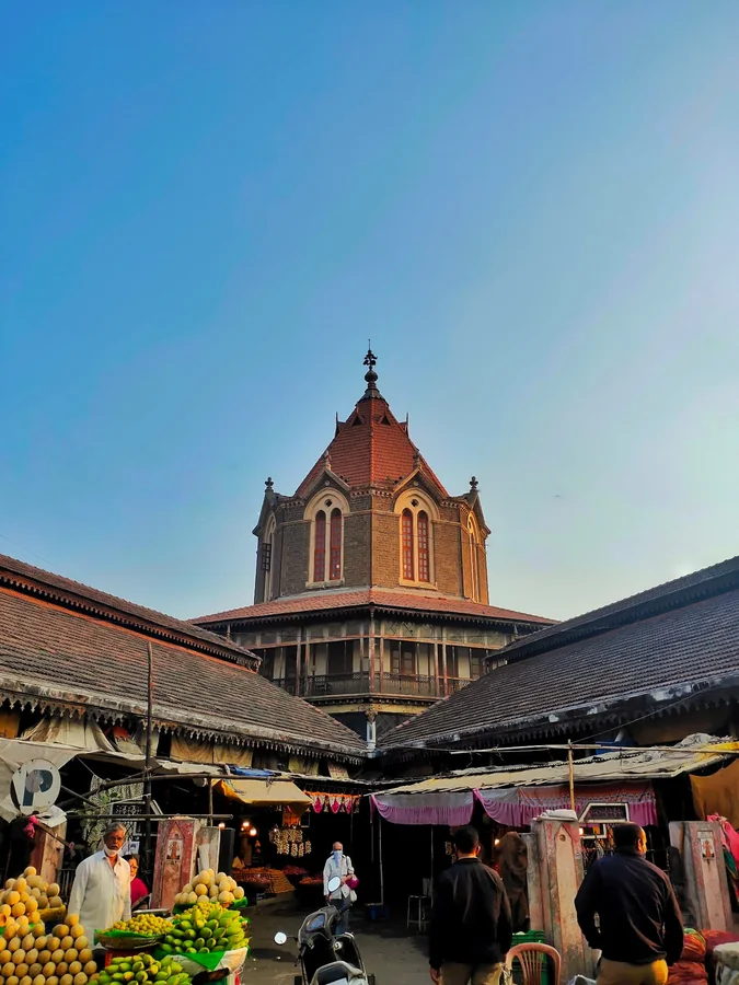 Fruit stalls beneath the historic roofs of an Indian market
